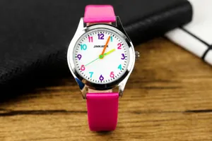 Orologio al quarzo per bambini con cinturino in pelle rosa e numeri colorati per imparare.
