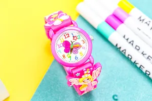 Close-up detail of 3D cute butterfly cartoon children quartz watch with pink silicone strap.