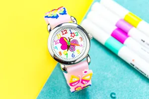 Kids cute 3D butterfly quartz watch detail showcase, pink strap with colorful numbers.