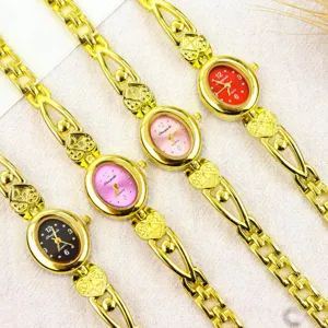 Women vintage bracelet quartz watch with oval dial and heart link strap, detail view.