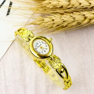Women vintage minimalist bracelet watch, oval small dial quartz watch with heart strap.