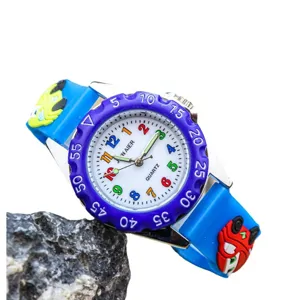 Kids quartz watch with vibrant blue cartoon car strap, luminous hands and colorful dial.