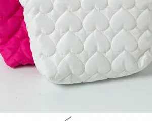 Quilted heart pattern clutch cosmetic bag, large capacity makeup organizer for women daily use.