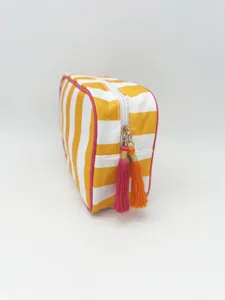 Striped makeup bag with tassels, large capacity waterproof travel cosmetic pouch for women.