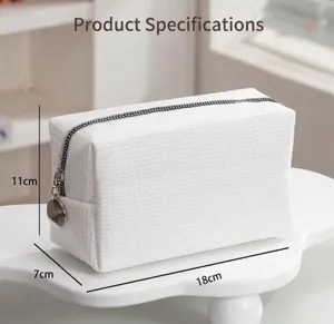 Borsa cosmetica a nido d'ape bianca grande capacità trousse trucco portatile vista dettaglio.
