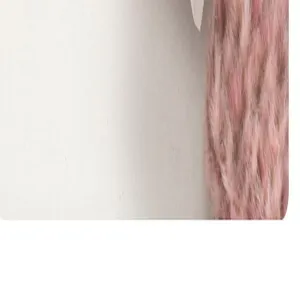 Plush cosmetic bag detail view, soft pink furry fabric for portable daily storage needs.