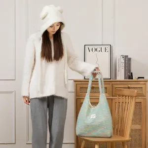 Fuzzy pastel tote bag for women, cute winter shoulder bag, large capacity fluffy student book bag.