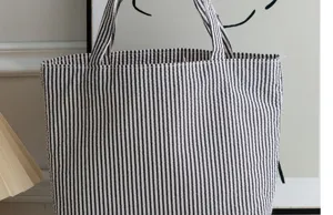 Classic black and white striped canvas tote bag, large capacity daily shoulder handbag.