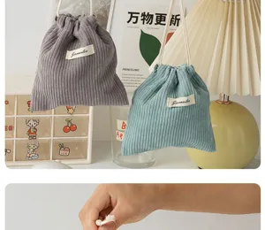 Corduroy drawstring storage bag portable makeup pouch small coin purse for women daily use.