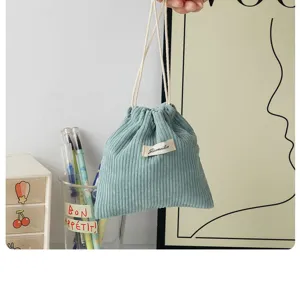 Corduroy drawstring pouch, cute mini portable storage bag for daily use and cosmetics.