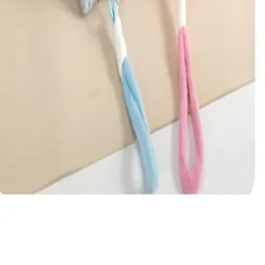 Plush cosmetic bag strap detail, soft fuzzy handle for women handbag, portable wash bag accessory.