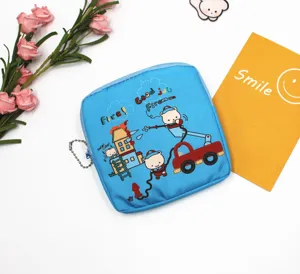 Close-up detail of the cute blue cartoon firefighter bear sanitary napkin storage pouch.