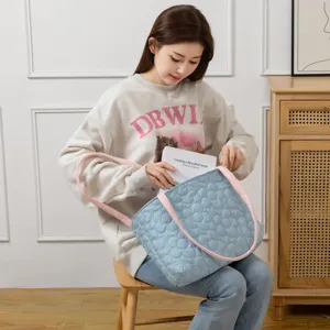 Quilted large capacity tote bag for women, stylish candy color shoulder shopping handbag.