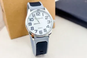 Detailed view of quartz watch dial with clear Arabic numerals and comfortable silicone strap.