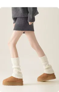 White knitted wool leg warmers for women, thick cozy winter y2k fashion boot cuffs.