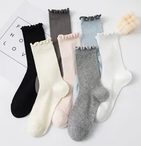 Women sweet ruffle mid-tube socks cotton daily casual socks set in multi soft colors.
