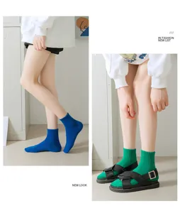 Pure color ribbed mid-tube socks for women, breathable cotton short socks for summer casual wear.