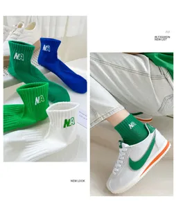 Trendy green and white mid-tube cotton socks with NA embroidery for women spring summer daily.