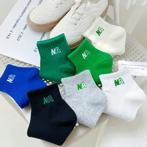 Colorful cotton short socks for women with embroidered letter design, trendy everyday casual style.