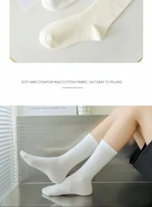 White cotton mid-tube socks detail view, soft and comfortable fabric for daily wear.