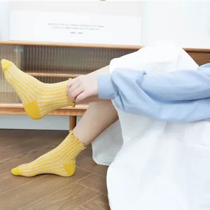 Japanese vintage women mid tube cotton socks with cute plaid pattern and ruffled lace edge.