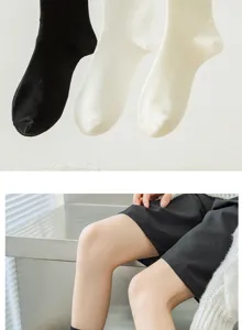 Women cotton mid tube socks detail view showing soft fabric comfort and simple daily style wear.