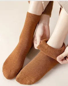 Thick winter warm thermal long socks with plush towel bottom for women daily wear warmth cozy.