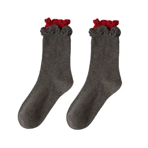 Women's grey mid-calf socks with red ruffle cuff, cotton knit Japanese JK style slouch socks.