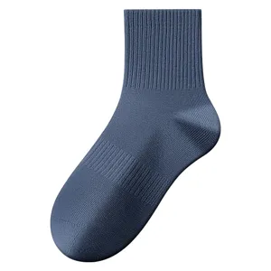 Men's solid color mid-calf cotton socks, breathable athletic ribbed casual crew socks.