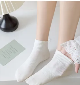 Close-up detail of white breathable mesh cotton short socks for women, perfect for summer daily wear.