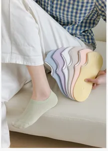 Close-up of breathable mesh boat socks for women, summer thin invisible low-cut socks display.