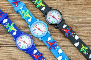 Kids cartoon quartz watch featuring airplane strap and colorful dial detail display.