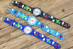 Children cartoon airplane quartz watch with silicone strap and colorful dial numbers for boys.