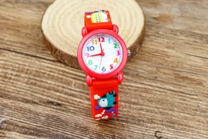 Children cartoon quartz watch detail closeup, colorful numbers dial and excavator red strap.