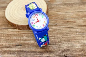 Kids cartoon quartz watch with colorful numbers and cute vehicle strap for boys learning time.