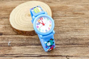 Kids cute cartoon quartz watch featuring blue silicone strap and colorful dial numbers for boys.