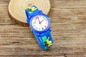 Kids cartoon quartz watch with blue silicone strap and cute excavator design for boys.