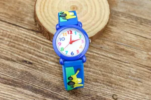 Close-up detail of children quartz watch with colorful dial numbers and cute excavator strap.
