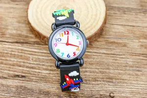 Kids cartoon quartz watch with 3D airplane strap colorful dial detail view for boys.