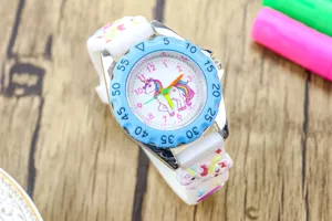 Kids cute unicorn quartz watch with silicone strap and blue bezel details detail shot