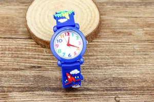 Kids cartoon quartz watch with blue airplane strap and colorful dial numbers for boys.