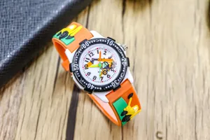 Children's cute excavator cartoon electronic watch, detail view of orange silicone strap.
