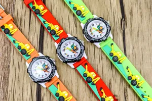Detailed view of kids cartoon excavator watches featuring colorful silicone straps and clear dials.