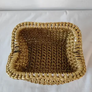 Gold metallic frame woven clutch bag detail view, vintage luxury evening handbag for women.