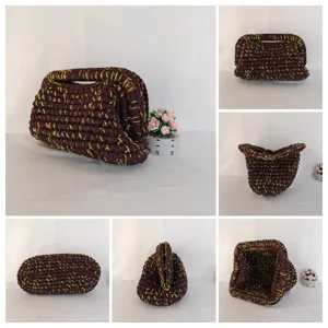 Handgefertigte Häkel-Clutch-Bag-Detailansichten mit feiner Goldfaden-Textur und elegantem Stil.
