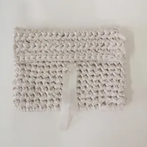 Handmade ribbon crochet laptop sleeve, soft textured tablet storage pouch for daily use.