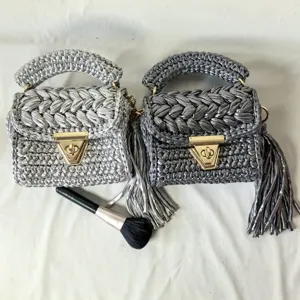 Handmade metallic crochet shoulder bag with twist lock and tassel, stylish mini square handbag.