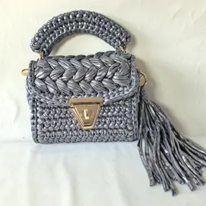 Silver metallic hand-crocheted woven shoulder square bag with elegant fringe tassel detail.