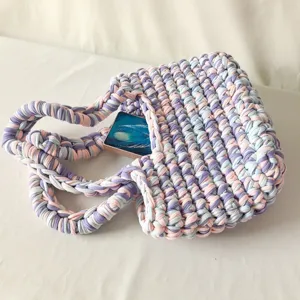 Handmade pastel crochet tote bag, cozy colorful knitted shoulder bag for daily casual wear.