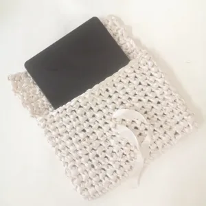 Handmade ribbon crochet laptop sleeve, stylish white tablet storage pouch for daily use.